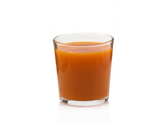 Carrot juice in a transparent cup on a white background. Isolated