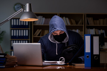 hacker stealing personal data from home computer