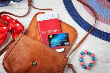 Poster - Composition with credit card and passport on bag. Travel concept