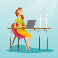 Wall Mural - Woman working with model of wind turbines.