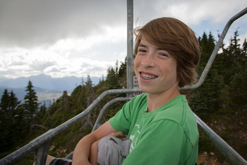 Boy on chair lift