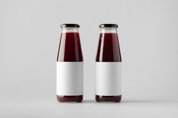 Sticker - Juice Bottle Mock-Up - Two Bottles. Blank Label