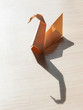 Origami bird on the table