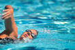 © Microgen - Female crawl swimmer