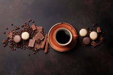 Coffee Cup, Chocolate And Macaroons On Old Kitchen Table