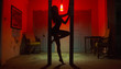 © kalcutta - Sexy Woman Silhouette Dancing at the Hotel. Pole Dancer female Stripper in the Night Sensual Red light, noir style