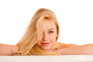 Wall Mural - skin care - beautiful young woman nurturing her skin isolated over white background