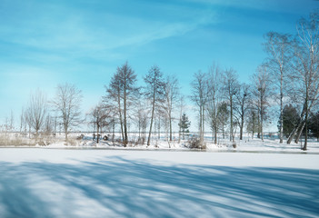 Sticker - Beautiful winter landscape with frozen river and blue sky