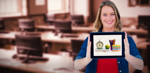 Canvas Print - Composite image of smiling woman holding tablet pc 