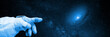astronaut pointing to a galaxy, background banner