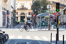 Woman Riding A Velib Bicycle In Paris