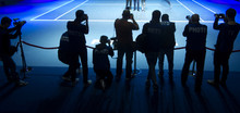 Photographers On The Tennis Court