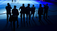 Photographers On The Tennis Court