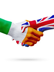 Wall Mural - Flags Ireland, United Kingdom countries, partnership friendship handshake concept.