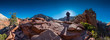 Female Backpacker Stands Toward the Sun Along trail to Angels Landing