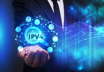 Business, Technology, Internet and network concept. Young businessman working on a virtual screen of the future and sees the inscription: IPv4