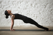 Young Yogi Attractive Woman Practicing Yoga Concept, Stretching In Purvottanasana Exercise, Upward Plank Pose, Working Out, Wearing Sportswear, Black Tank Top, Pants, Full Length, Loft Background