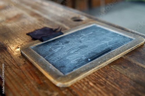 Old School Tablet With Letters And Pen On The Wooden Bench Buy