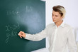 © Africa Studio - Schoolboy answering at blackboard in classroom