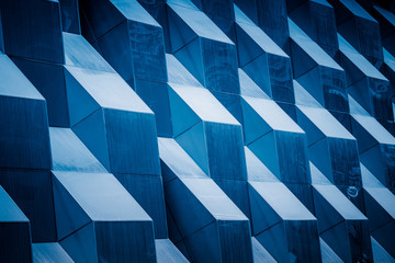 detail shot of modern architecture facade,business concepts in blue tone,shot in city of China.