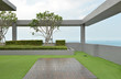© tampatra - sky garden on rooftop of condominium with blue sky