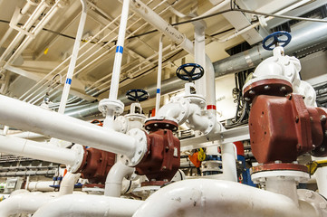 Wall Mural - Industrial, steel pipe lines valves in ship’s engine room