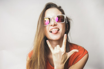 Rock gesture funny woman in glasses