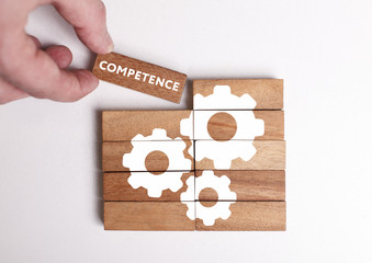 Business, Technology, Internet and network concept. Young businessman shows the word: Competence