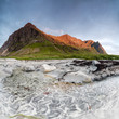 © ClickAlps - Panoramic of rocky peaks lighted up by midnight sun Skagsanden Ramberg Nordland county Lofoten Islands Northern Norway Europe