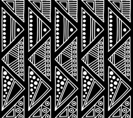 Wall Mural - Seamless vector pattern. Black and white geometrical background with hand drawn decorative tribal elements. Print with ethnic, folk, traditional motifs. Graphic vector illustration.