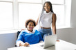 © Louis-Paul Photo - Mother And Teenage Daughter Looking At Laptop Together