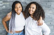 © Louis-Paul Photo - Two young afro girls having fun together
