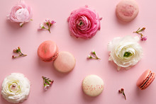 Flower And Macarons Pattern On A Pink Background. Various Flower Flat Lay. Top View