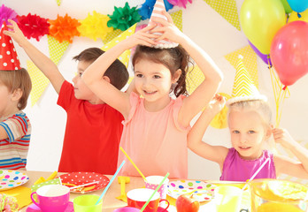 Wall Mural - Cute little children celebrating birthday at party