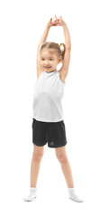 Poster - Cute girl doing gymnastic exercises on white background