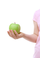 Wall Mural - Child hand holding apple on white background