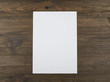 © Freestocker - Blank sheet on brown wooden table. Horizontal shoot.