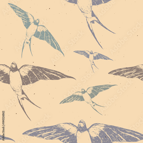 Tapeta ścienna na wymiar Hand drawn with ink pen pattern with colored swallow on beige background. Flying birds in the sky perfect for fabrics and textile or paper design. Trendy and fashion background.