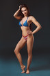 © nazarovsergey - sexy young woman in erotic fetish wear dancing striptease in nightclub. Nude sexy woman in Show suit.