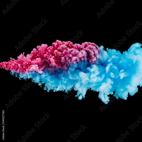 Color Splashes Of Ink Isolated On Black Background Abstract Paint In Water Motion Swirling Colorful Drops Wall Mural Bravissimos