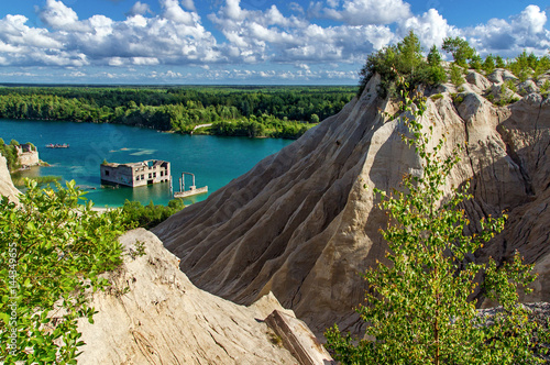 Fotomural mountain, forest and turquoise lake in the village of Rummu