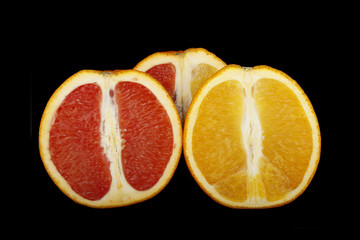 red and yellow orange slice isolated on black background