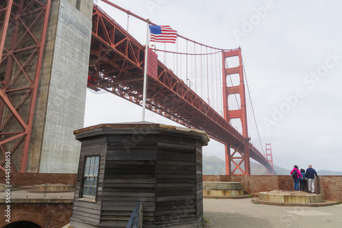 Fotografie, Obraz Old Civil War era seacoast fort under the Golden Gate Bridge in San Francisco