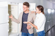 © JackF - Ordinary happy couple looking at fridges