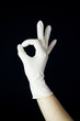 © Lasha Kilasonia - hand with white Glove on black