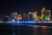 The Skyline And Atlantic Ocean At Night, In Atlantic City, New Jersey.
