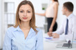 © rogerphoto - Portrait of a young business woman  at meeting.