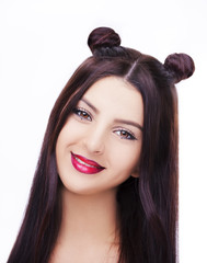 Wall Mural - Young happy beautiful woman with bright makeup hairstyle with horns on a white background