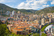 City of Monte Carlo view, residential buildings raised on mountains. 