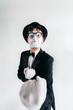 © Nomad_Soul - Comedy mime artist in glasses and makeup mask